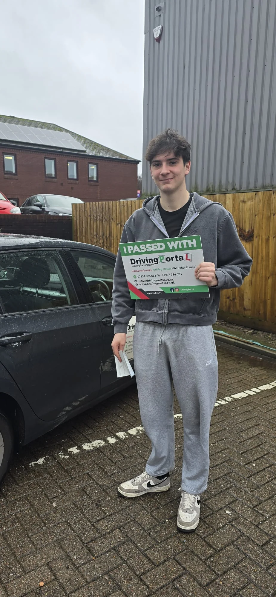 Learner celebrating with Driving Portal